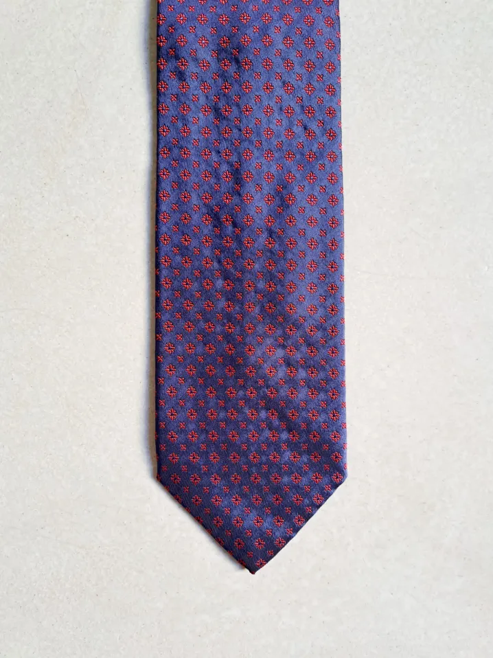 CRAVATTA MOTIVO MICRO FIORELLINO BLU ROSSO