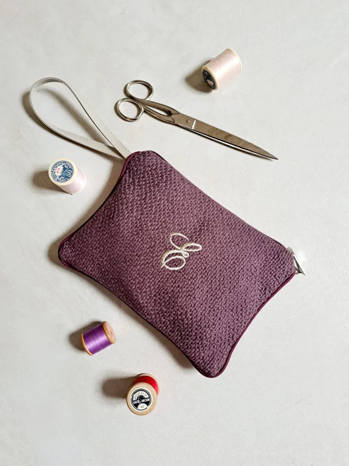 POCHETTE CON MANICO MONOGRAM
